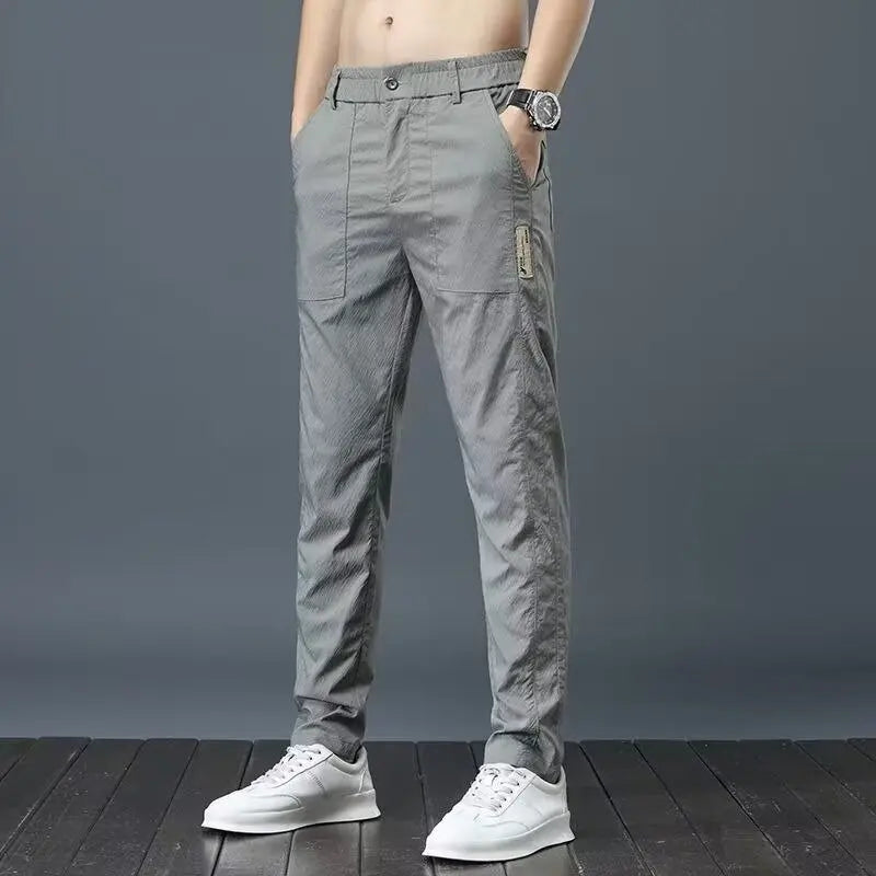 Calça casual masculina, cós semi-elástico